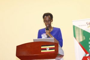 Prof. Monica Chibita the Dean- Faculty of Journalism, Media and Communication at Uganda Christian University, Mukono, delivering a keynote address at the dinner