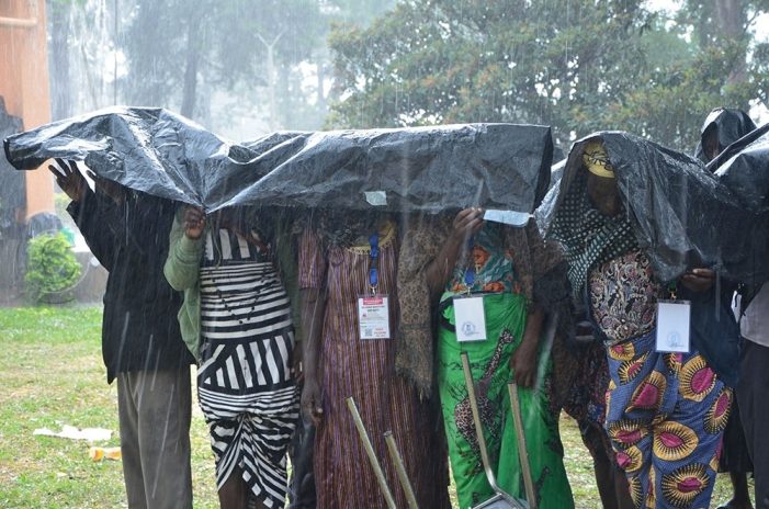 people seek shelter at Namugongo amidst heavy rain