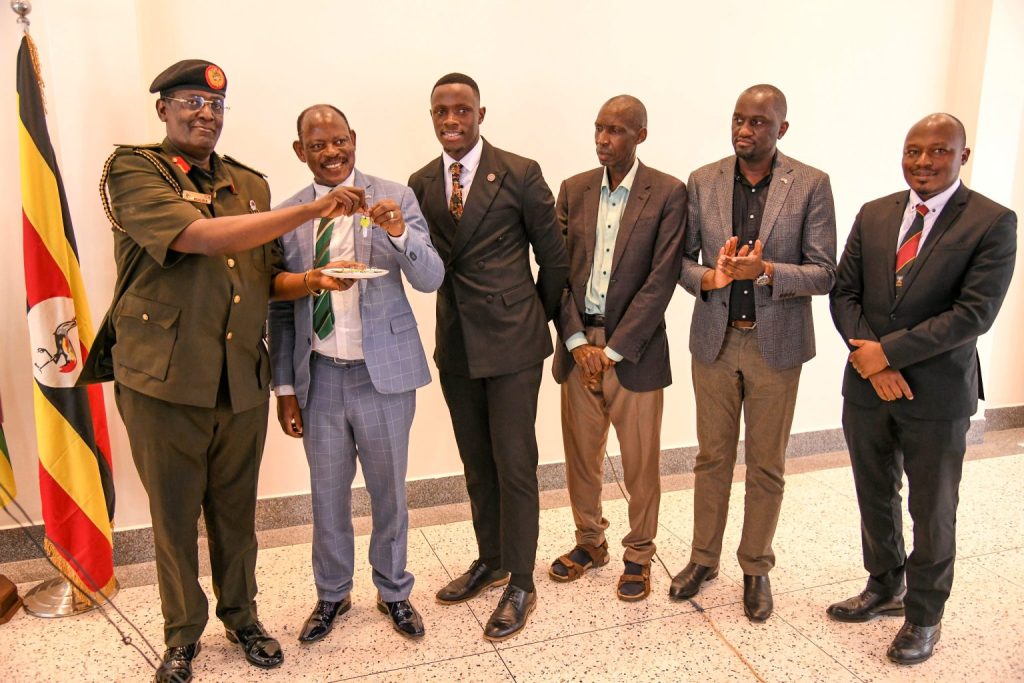 Left to Right: MD and CEO NEC-Lt. Gen. James Mugira conducts a symbolic handover of keys to the Vice Chancellor-Prof. Barnabas Nawangwe as 91st Guild President-H.E. Ssentamu Churchill James, Principal CEES and Ag. DVCFA-Prof. Anthony Muwagga Mugagga, Deputy University Secretary-Mr. Simon Kizito and Deputy Dean of Students-Dr. Rodney Rugyema witness on 25th July 2025.